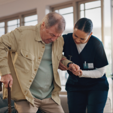 woman assisting elderly
