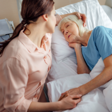 woman taking care of elderly