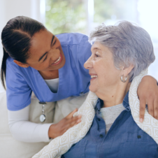 woman and elderly smiling