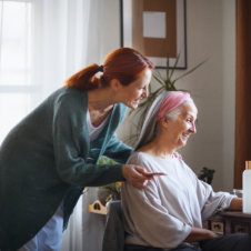 woman and elderly smiling