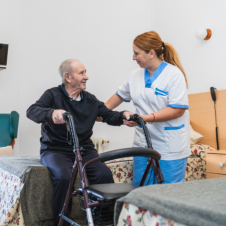woman assisting elderly