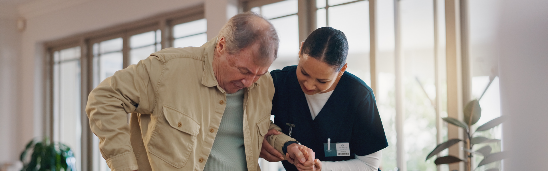 woman assisting elderly