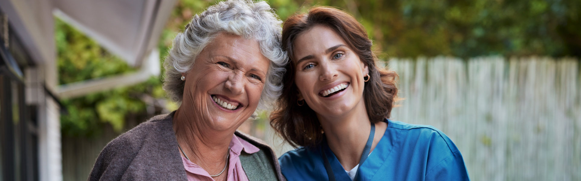 woman and elderly smiling