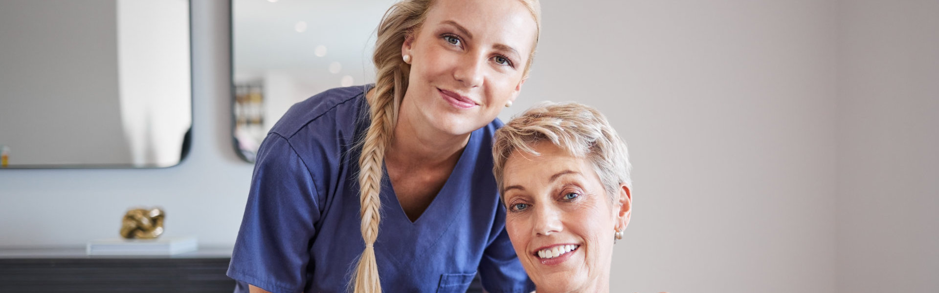 woman and elderly smiling