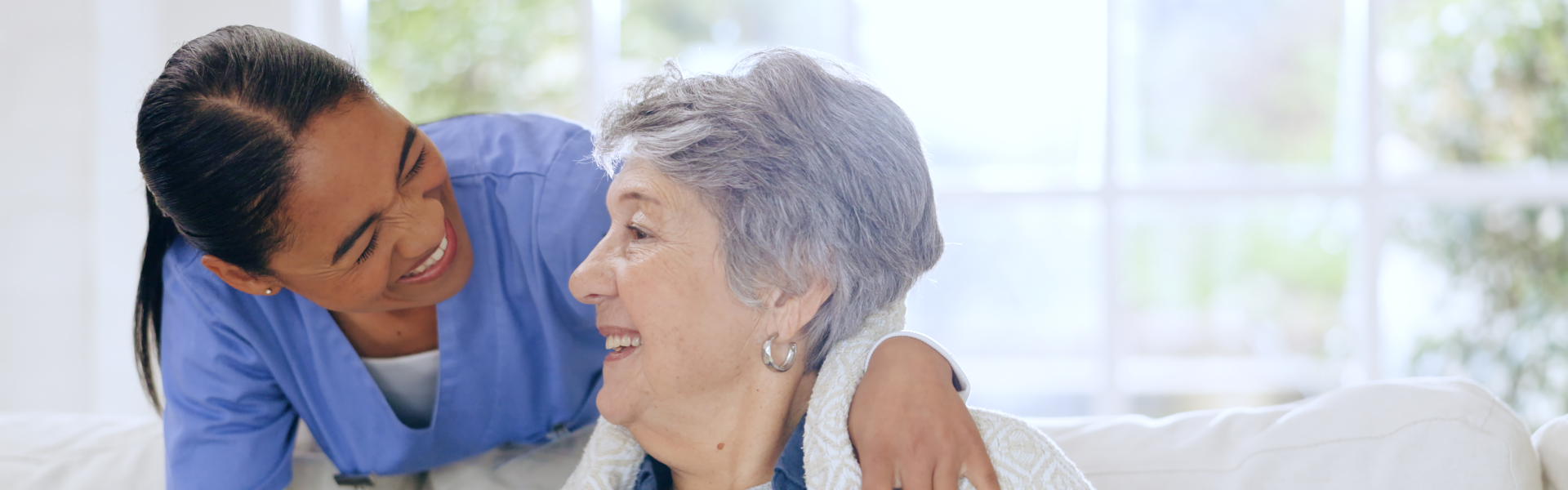 woman and elderly smiling